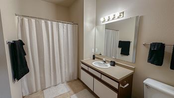 the preserve at ballantyne commons bathroom with sink and shower